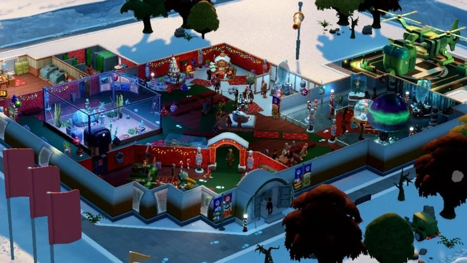 雪景色の中に広がる、クリスマスデコレーションで飾られた建物群の俯瞰図です