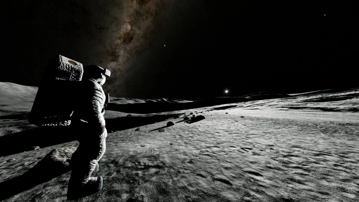 広大な月面で星空を見上げる宇宙飛行士