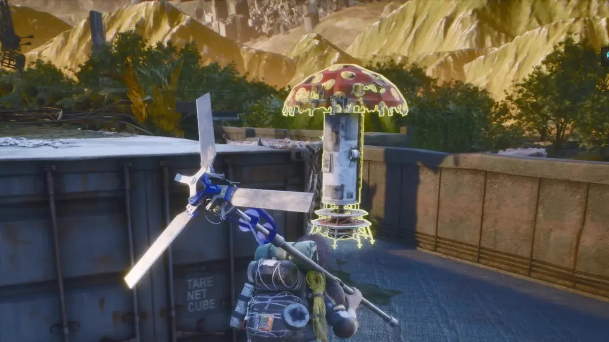 キャラクターが光るキノコ状の構造物がある荒廃した屋外環境に立っている様子