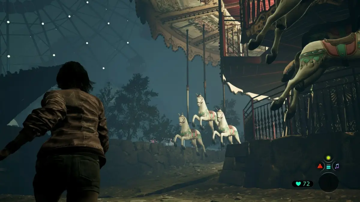 廃墟の遊園地を探索するゲーム画面