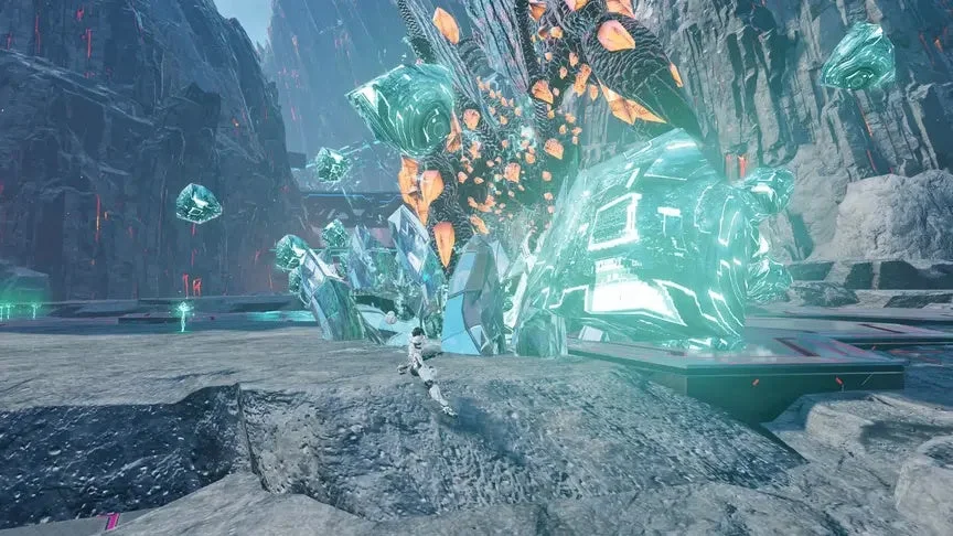 未来的な荒野に、巨大な青緑色のクリスタル構造物が光を放ちながら砕け散る様子