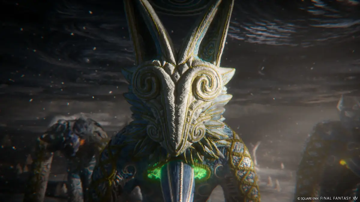 ファイナルファンタジーXIVに登場する、鳥のような頭部を持つ荘厳で神秘的な巨大像。白、金、青の装飾が施され、胸元が緑色に輝いている。暗く幻想的な背景に立つ。