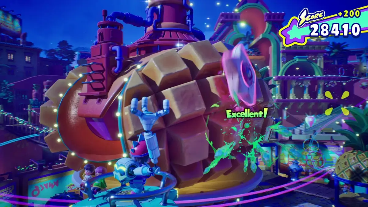 ゲーム画面：未来的な街並みを背景に、カラフルな巨大オブジェクトとロボット