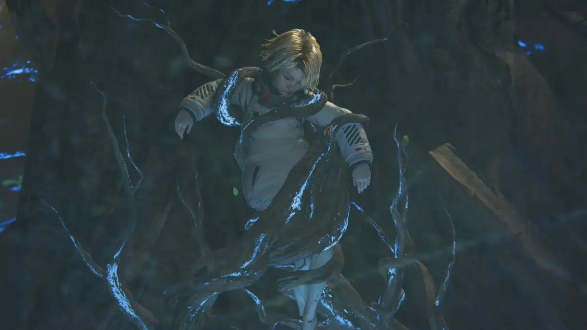 光る根に絡まる人物