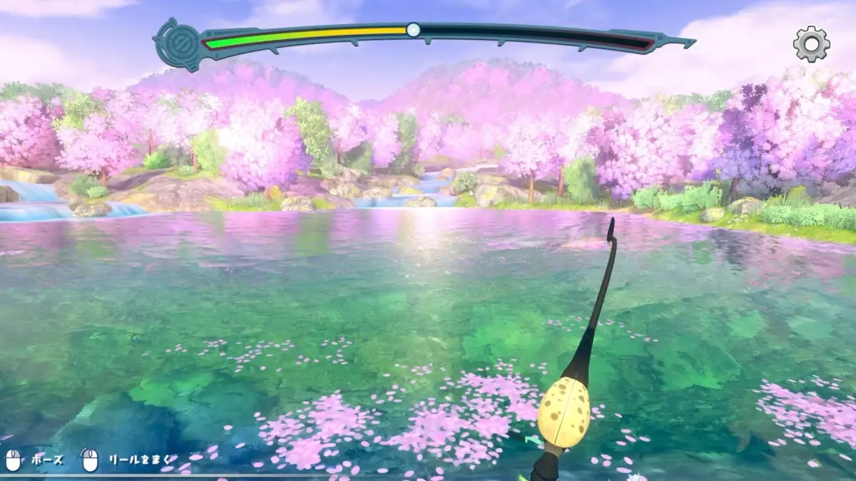 桜が満開の美しい渓谷で釣りを楽しむ様子