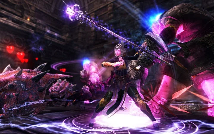 女性のファンタジーキャラクターが光る杖を手に、巨大なモンスターたちと魔法戦闘を繰り広げている様子
