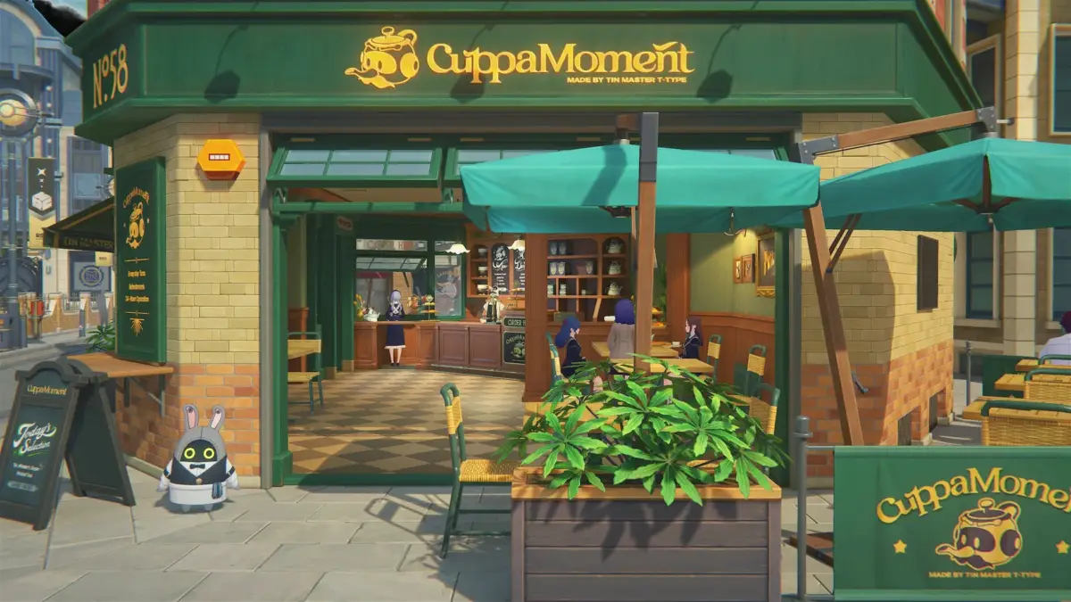 アニメ調の街角にある「CuppaMoment」というカフェの外観。緑の看板とパラソルが特徴的で、店内には店員や客が見える。店先にはウサギのキャラクターとメニューボードが置かれている。