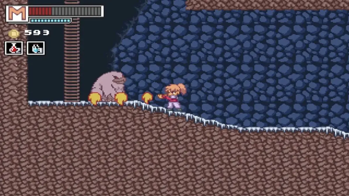ピクセルアートのゲーム画面で、女性キャラクターが洞窟のような場所で毛むくじゃらのモンスターと対峙し、炎のような攻撃を放っている場面です。