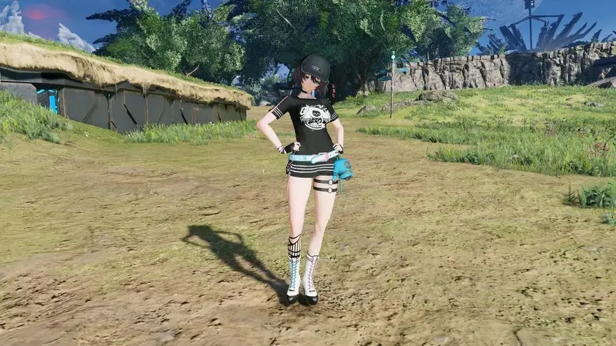 黒いTシャツとショートパンツ姿のアニメ調の女性キャラクターが、両手を腰に当ててポーズをとっている。緑と土が広がる屋外フィールドには、未来的な建造物が見える。